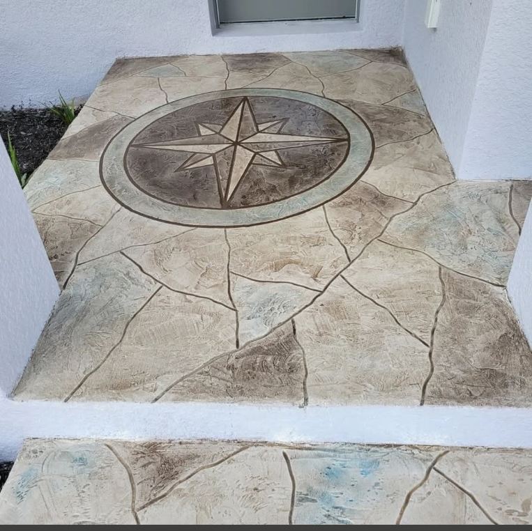 Flagstone overlay front entry with a compass rose medallion