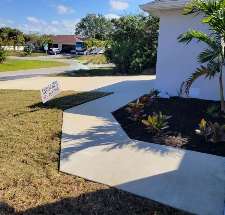 Plain concrete front walkway before overlay