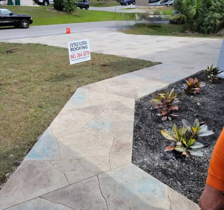 Front walkway finished with a stamped flagstone overlay