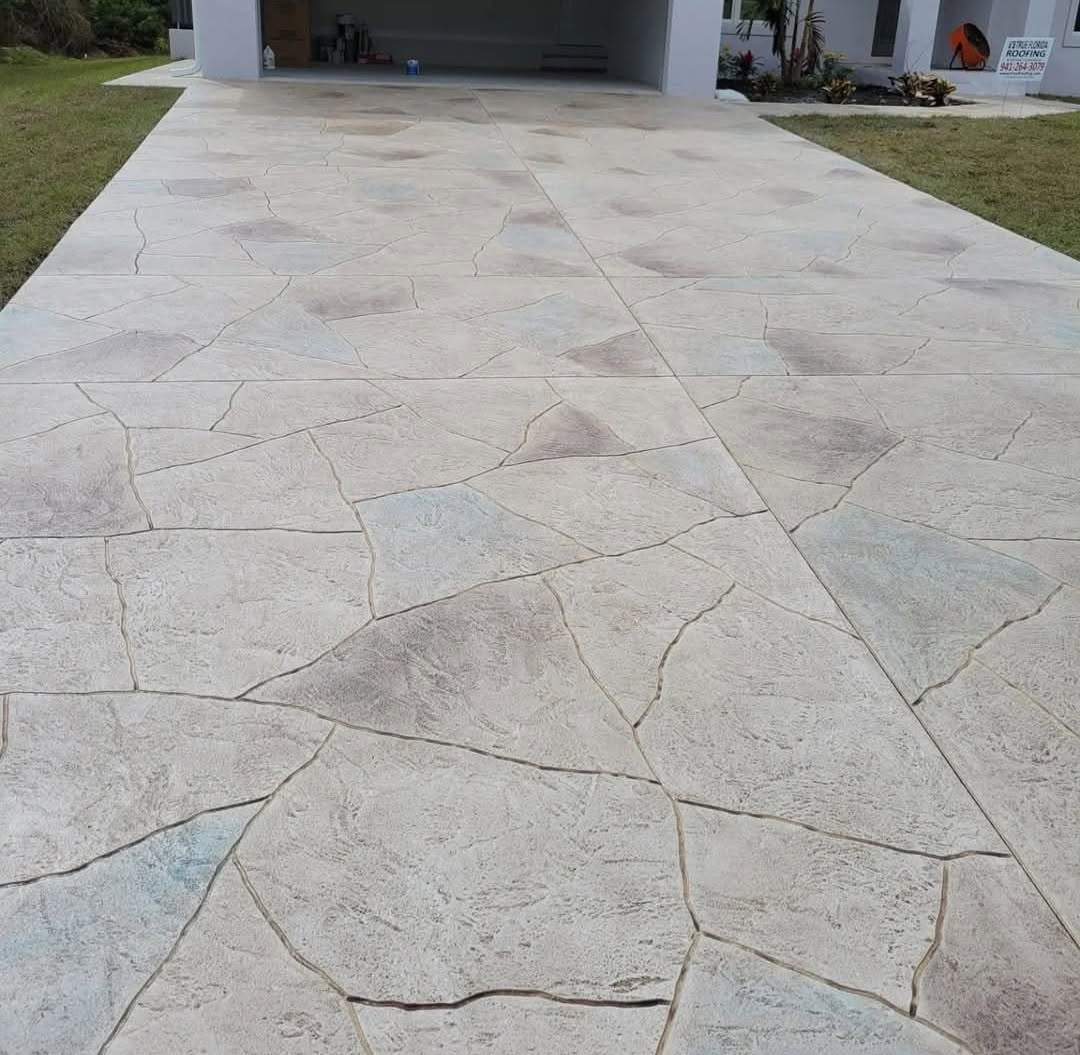Stamped flagstone driveway overlay in cream and grey